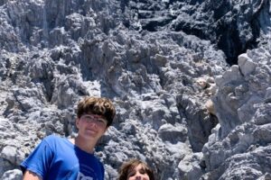 Victor and Paul in front of obsidian rock at Bahia Pulpito